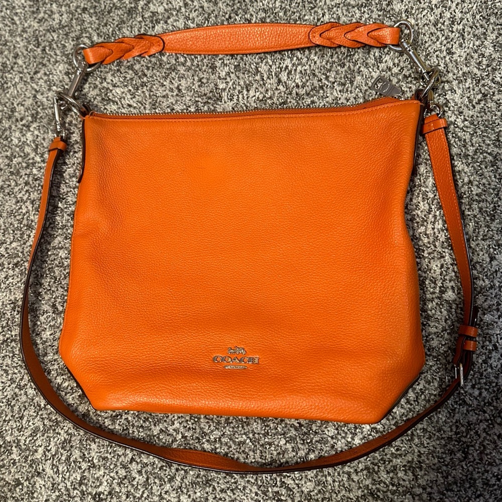 Coach leather purse in rusty orange